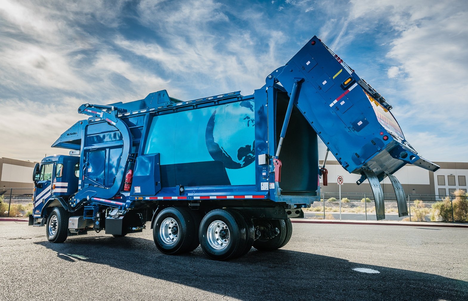 Blue refuse truck with CNG fuel system